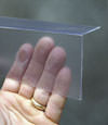 Closeup of a clear plastic covering on a Andover crawl space block wall
