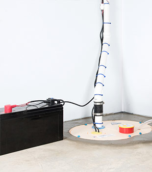A sump pump installed in Winona by Victor Barke's Complete Basement Systems