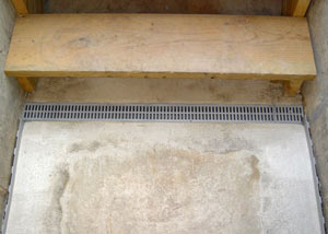 Our grated drain system installed on a leaking basement staircase in Minnetonka.