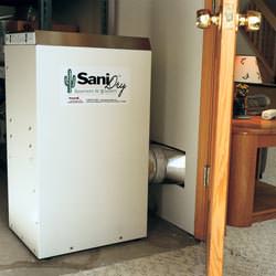 A basement dehumidifier with an ENERGY STAR® rating ducting dry air into a finished area of the basement  in Champlin