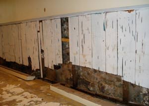 A wet, flooded finished basement in Circle Pines