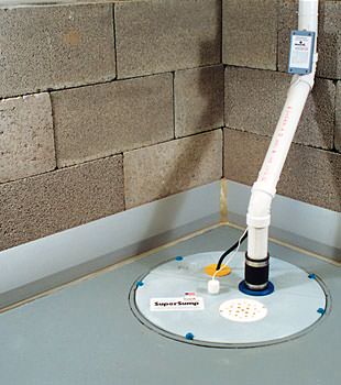 A baseboard basement drain pipe system installed in Andover