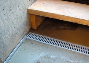a hatchway entrance in Elk River that has been protected from flooding by our TrenchDrain basement drainage system.