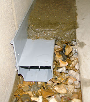 A basement drain system installed in a Coon Rapids home