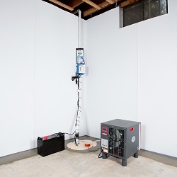 Sump pump system, dehumidifier, and basement wall panels installed during a sump pump installation in Stillwater
