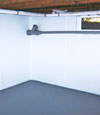Rochester, MN wet basement wall covering that tucks into a perimeter drainage system