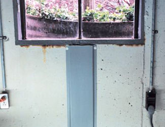 Repaired waterproofed basement window leak in Burnsville
